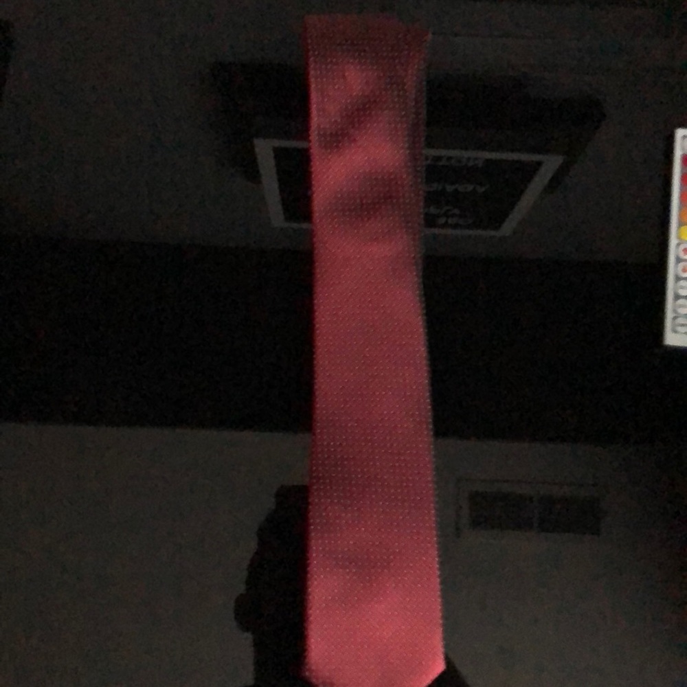 Maroon tie with white dots